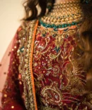 Nazakat - Bridal Embroidered Maroon Lehnga Choli with a Net Dupatta